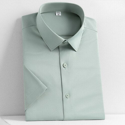 New Men's Short Sleeved Shirt Business Solid Color Men's Half Sleeved Inch Shirt Slim Fitting and Non Ironing Trend