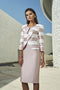 pink mikado with a tubed cut to the knee with V neckline dress Two-tone white pink striped jacket with original ruffle closure.